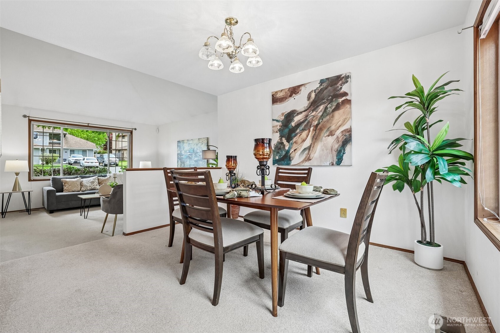 15601 160th Court Southeast Renton, WA 98058 - Photo 5 of 19 a view of a livingroom with furniture and a potted plant