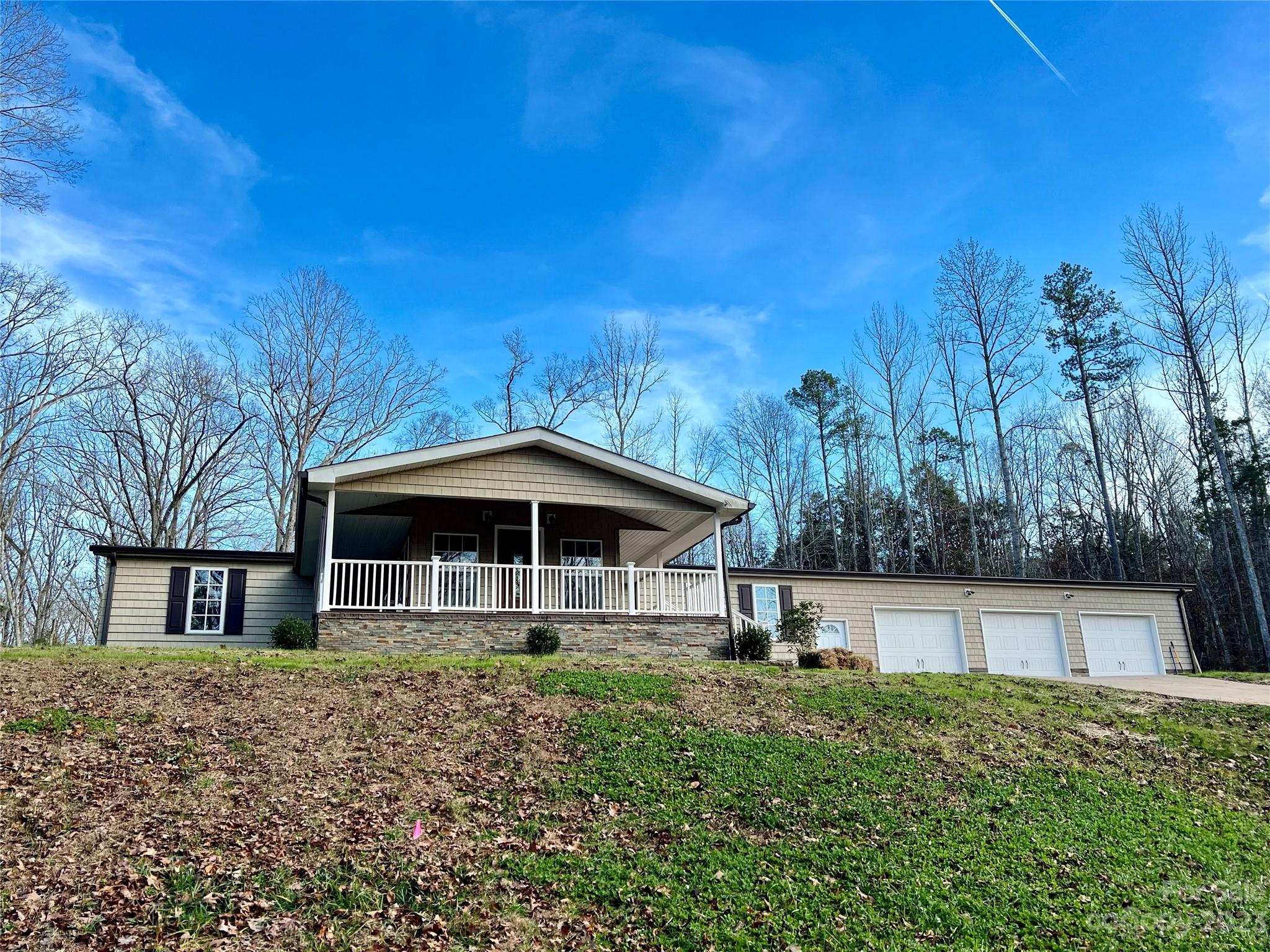 3413 Cedar Circle Road Lancaster, SC 29720 - Photo 1 of 45 a front view of a house with a yard