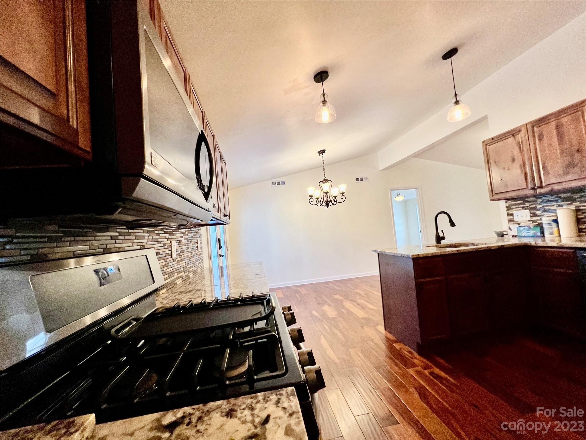 3413 Cedar Circle Road Lancaster, SC 29720 - Photo 16 of 45 a kitchen with a stove and a microwave