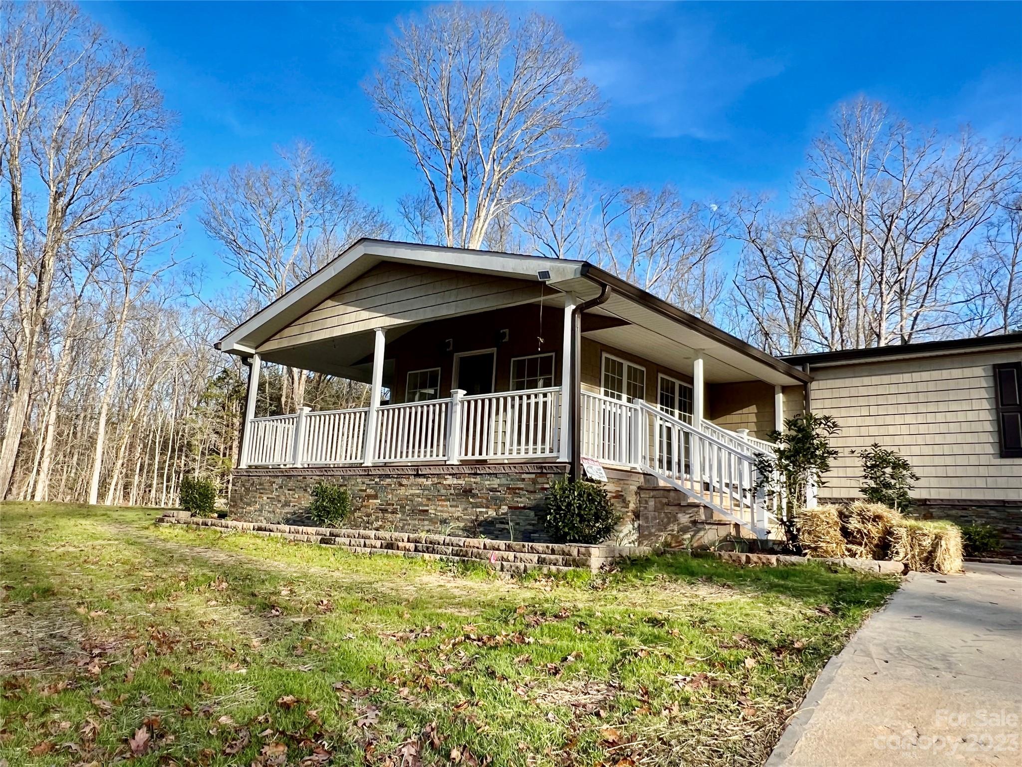 3413 Cedar Circle Road Lancaster, SC 29720 - Photo 2 of 45 a house with trees in the background