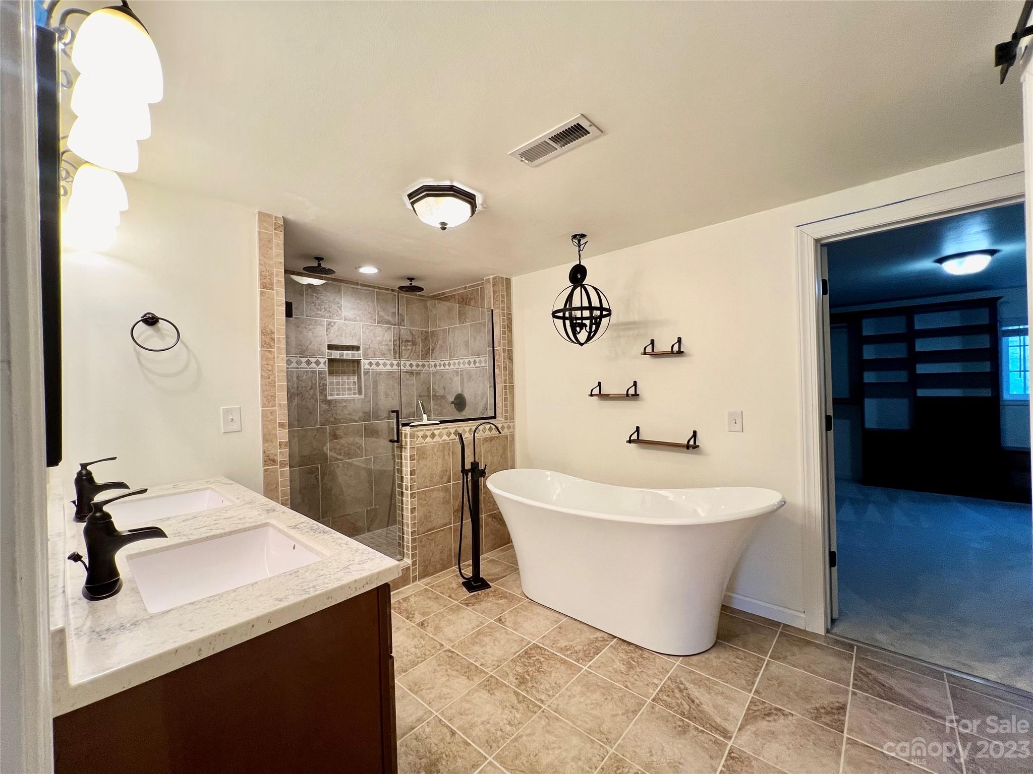 3413 Cedar Circle Road Lancaster, SC 29720 - Photo 24 of 45 a spacious bathroom with a sink and a mirror