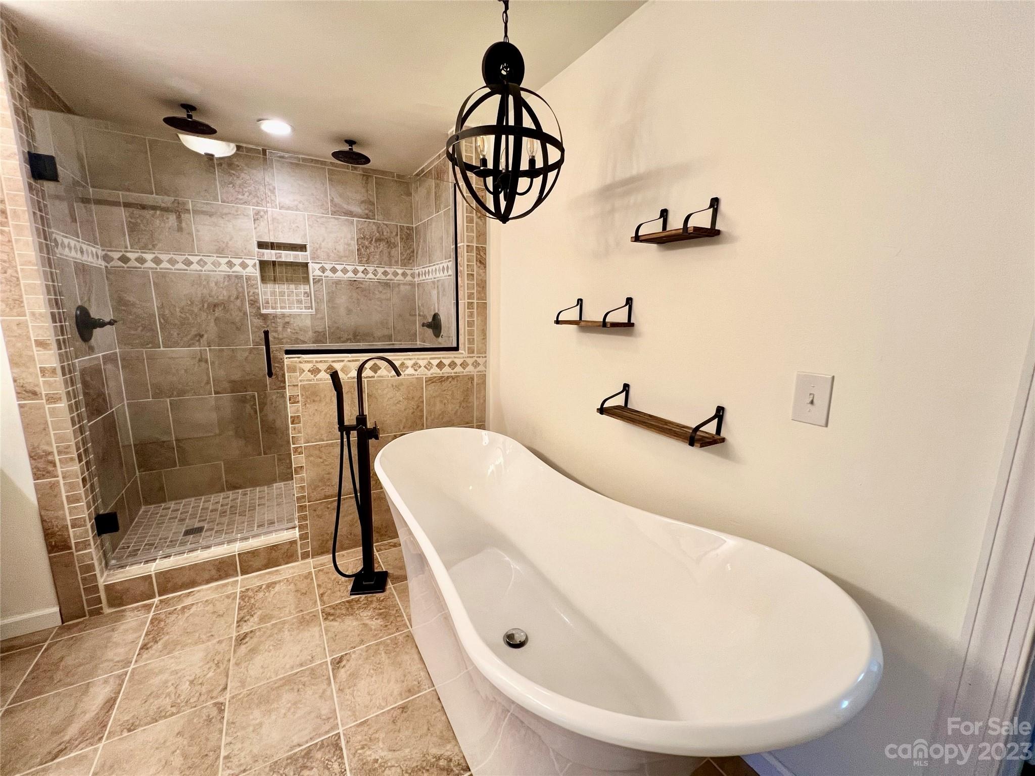 3413 Cedar Circle Road Lancaster, SC 29720 - Photo 26 of 45 a bathroom with a bathtub and shower