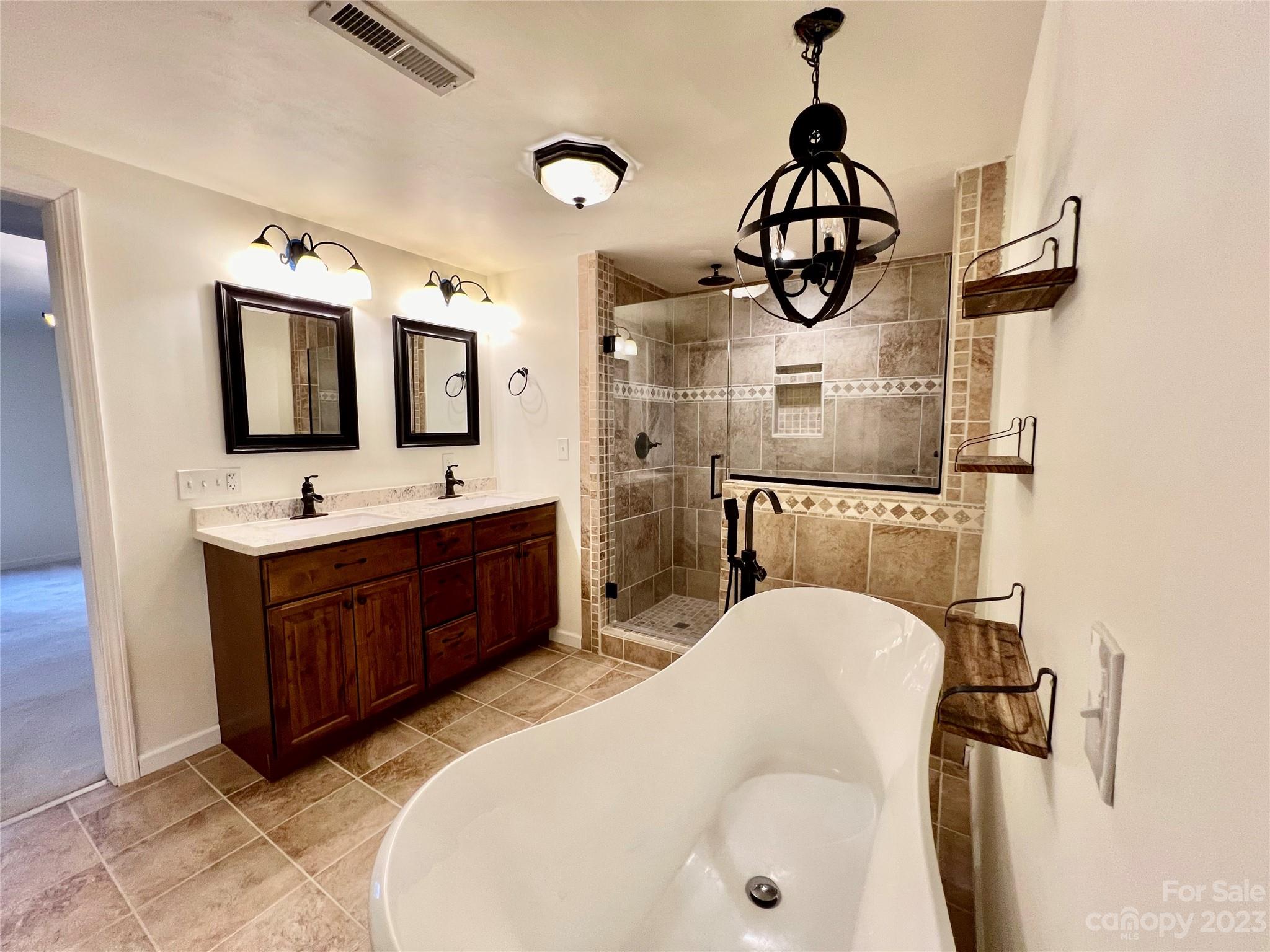 3413 Cedar Circle Road Lancaster, SC 29720 - Photo 27 of 45 a bathroom with a sink a mirror and shower