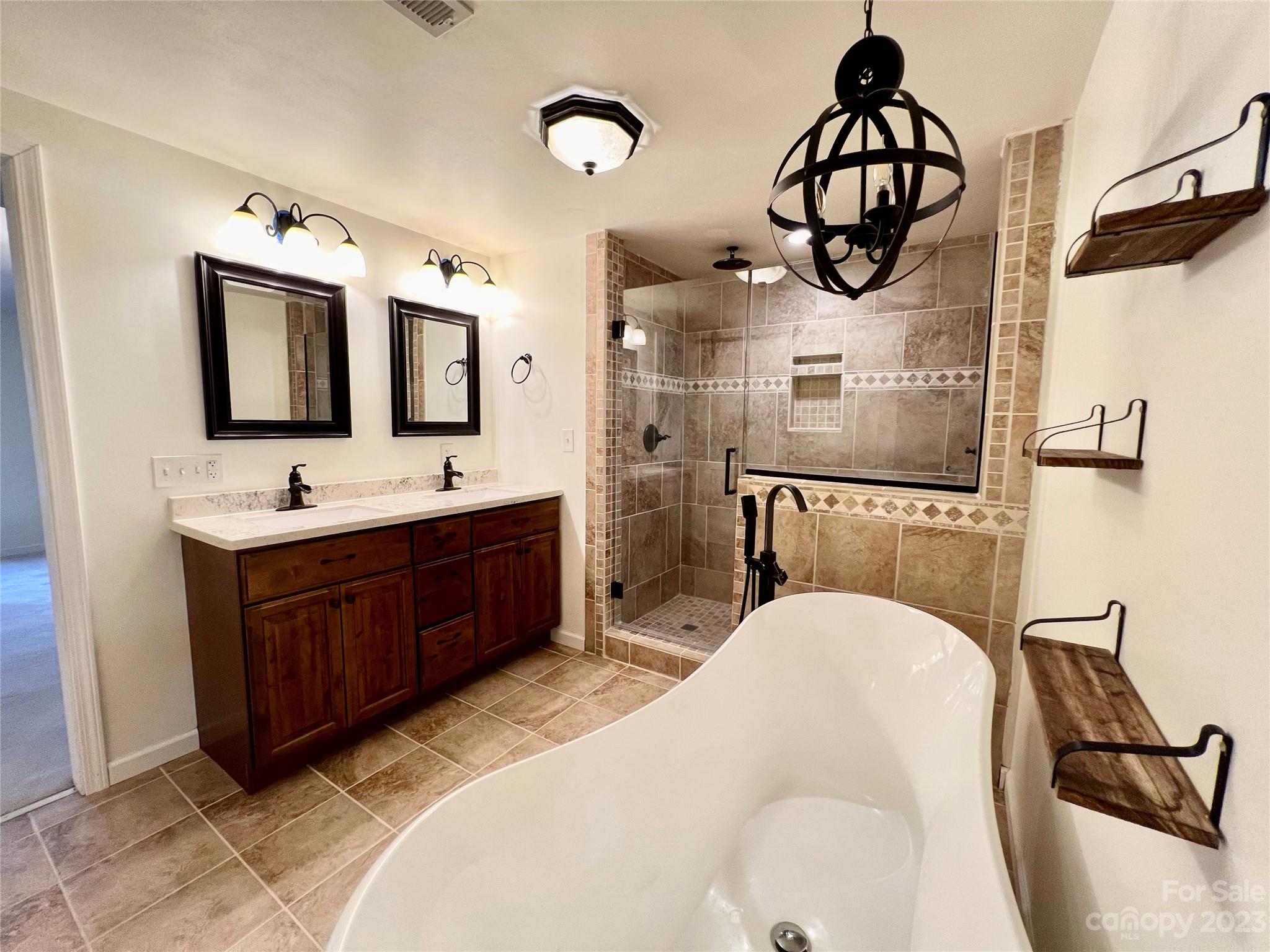 3413 Cedar Circle Road Lancaster, SC 29720 - Photo 29 of 45 a spacious bathroom with a sink a vanity and mirror