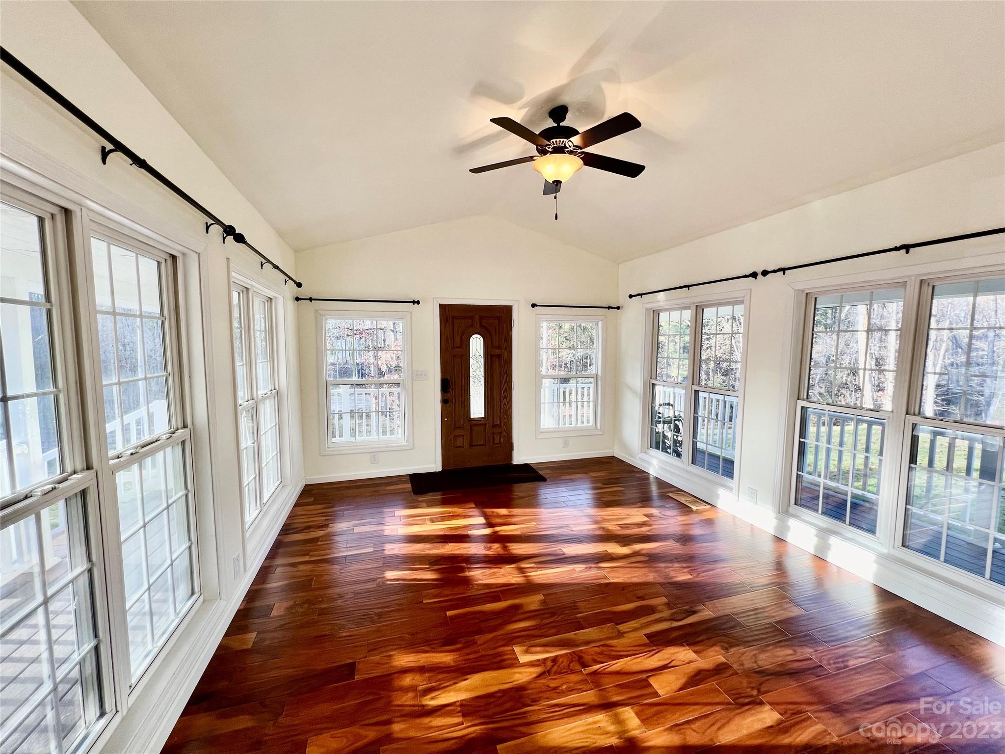 3413 Cedar Circle Road Lancaster, SC 29720 - Photo 7 of 45 a view of an empty room with wooden floor and a window