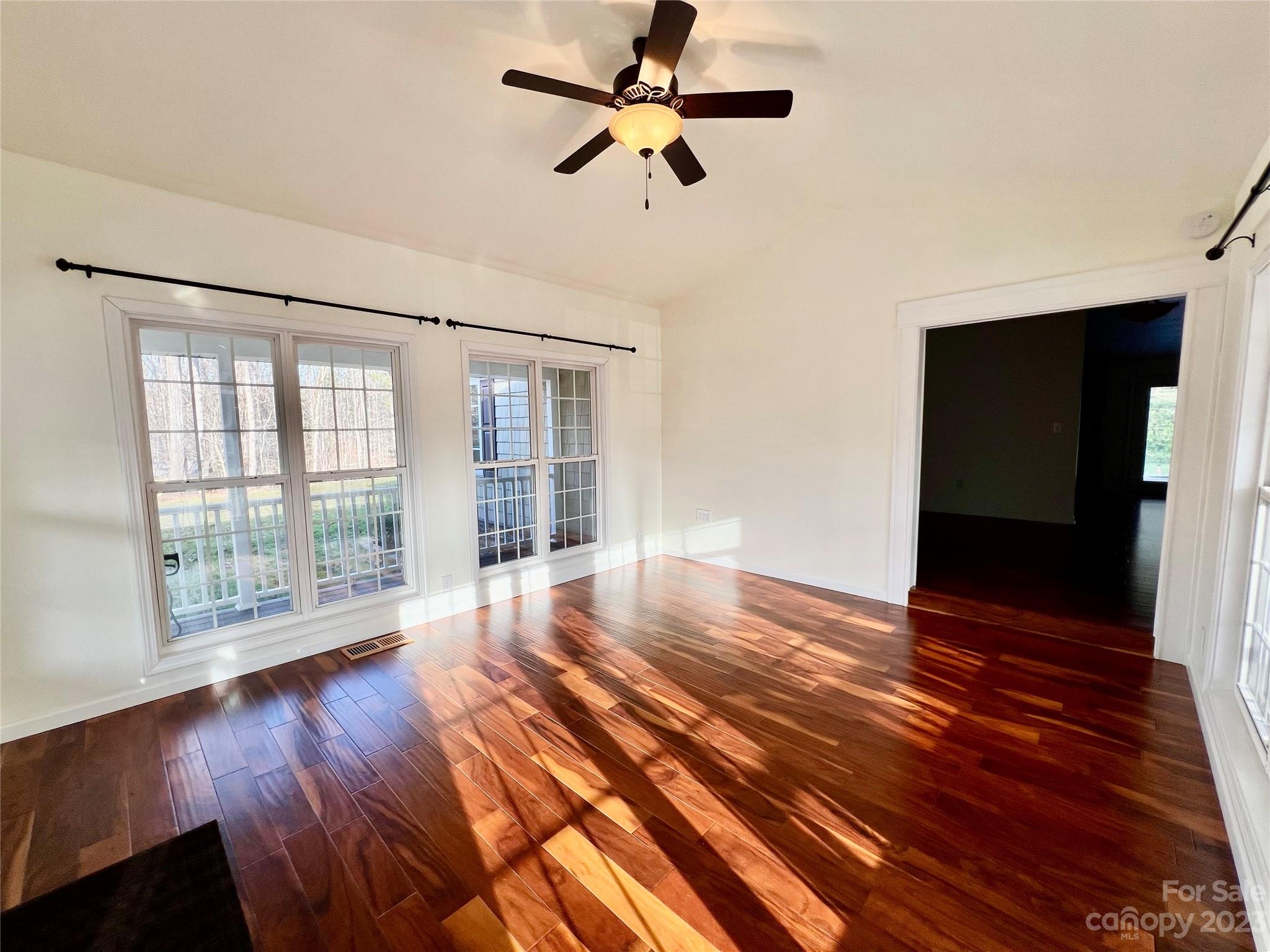 3413 Cedar Circle Road Lancaster, SC 29720 - Photo 8 of 45 a view of empty room with wooden floor and fan