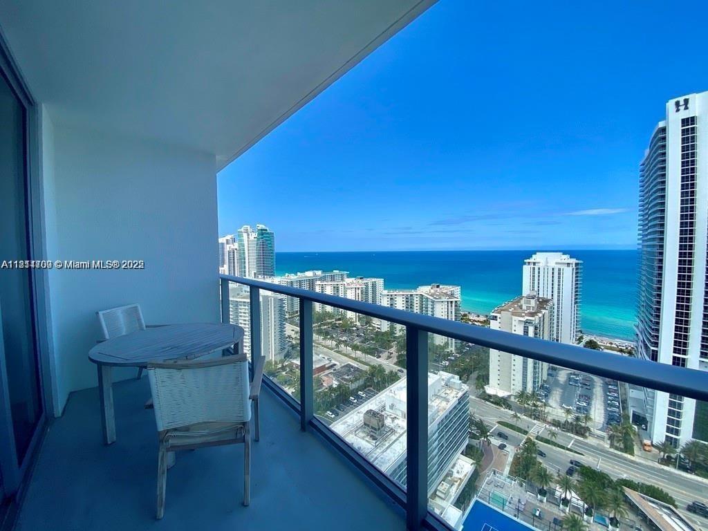 4010 South Ocean Drive, Unit R1905 Hollywood, FL 33019 - Photo 29 of 84 a view of a balcony with chairs