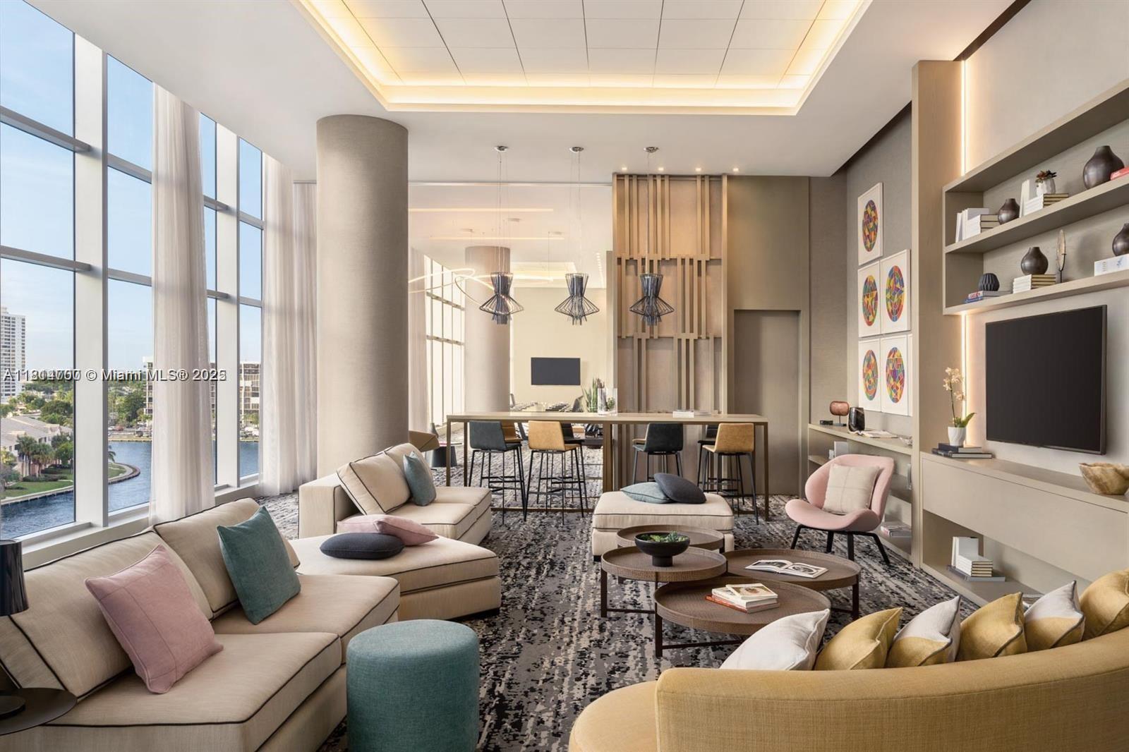 4010 South Ocean Drive, Unit R1905 Hollywood, FL 33019 - Photo 41 of 84 a living room with furniture and large windows