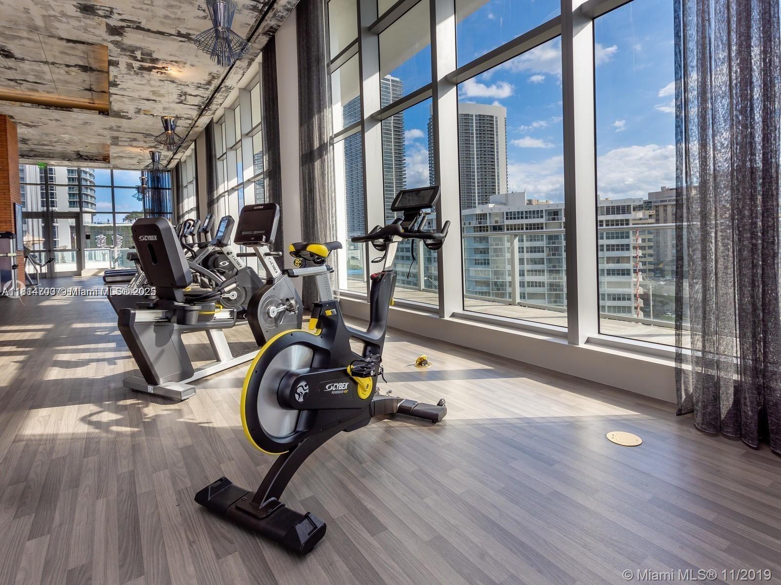 4010 South Ocean Drive, Unit R1905 Hollywood, FL 33019 - Photo 54 of 84 a view of a room with gym equipment