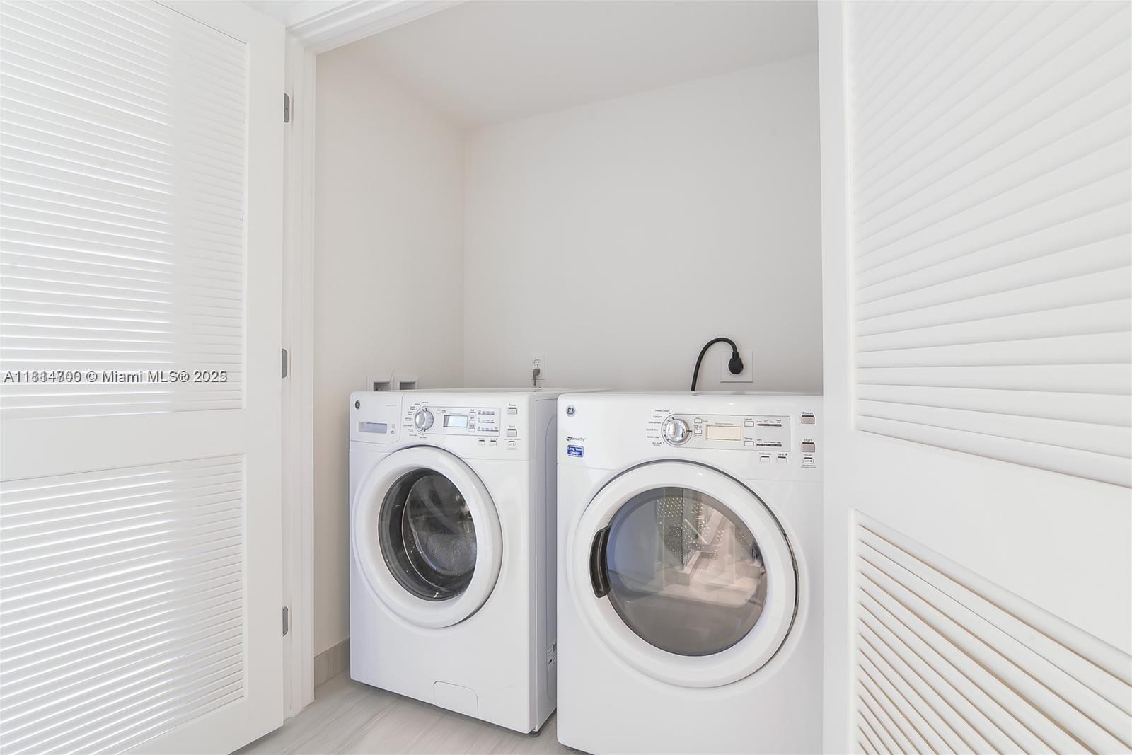 4010 South Ocean Drive, Unit R1905 Hollywood, FL 33019 - Photo 57 of 84 a utility room with dryer and washer