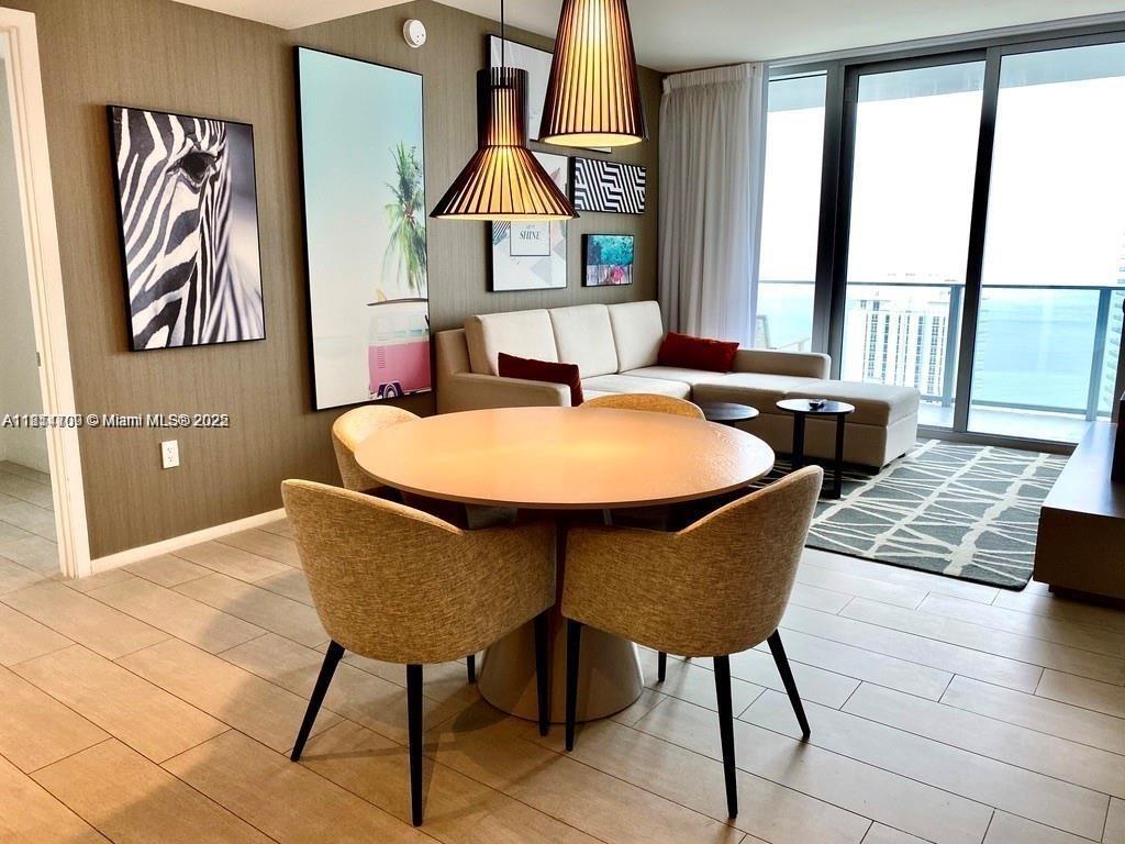 4010 South Ocean Drive, Unit R1905 Hollywood, FL 33019 - Photo 6 of 84 a living room with furniture and large window