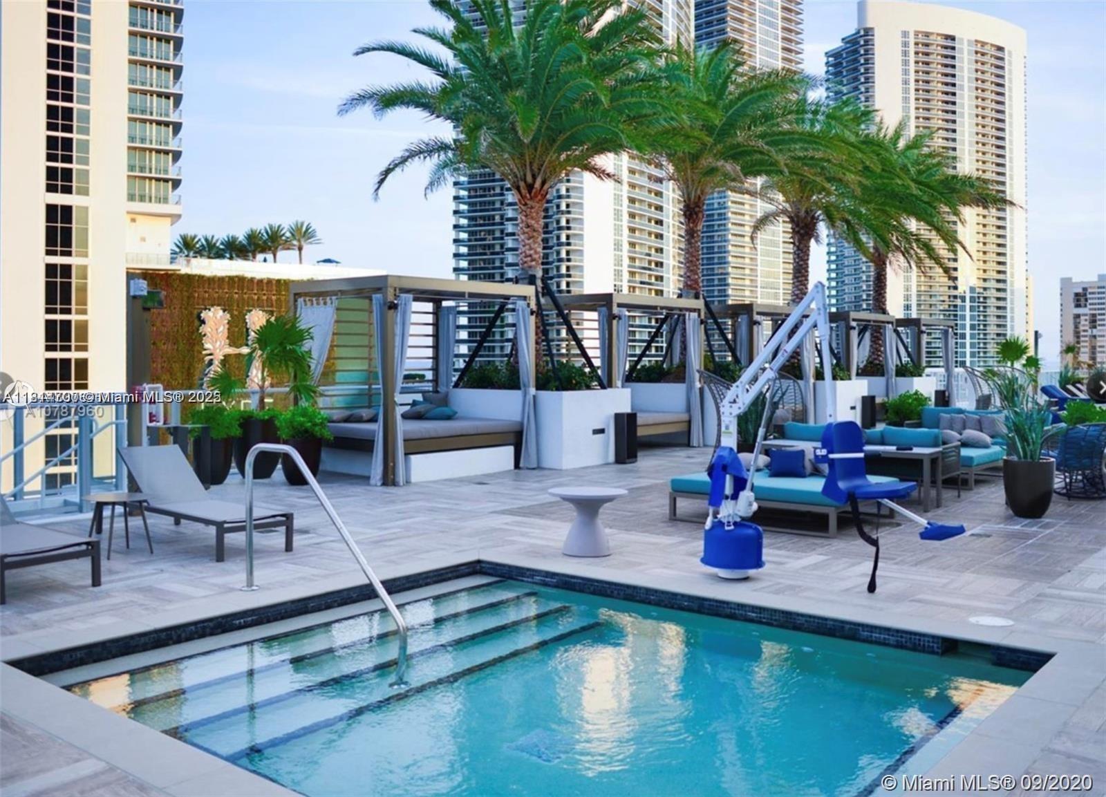 4010 South Ocean Drive, Unit R1905 Hollywood, FL 33019 - Photo 69 of 84 a view of a house with swimming pool and sitting area