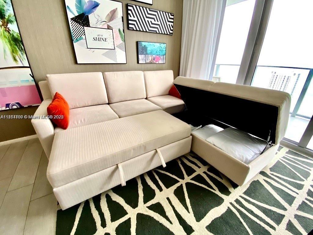 4010 South Ocean Drive, Unit R1905 Hollywood, FL 33019 - Photo 7 of 84 a living room with a couch