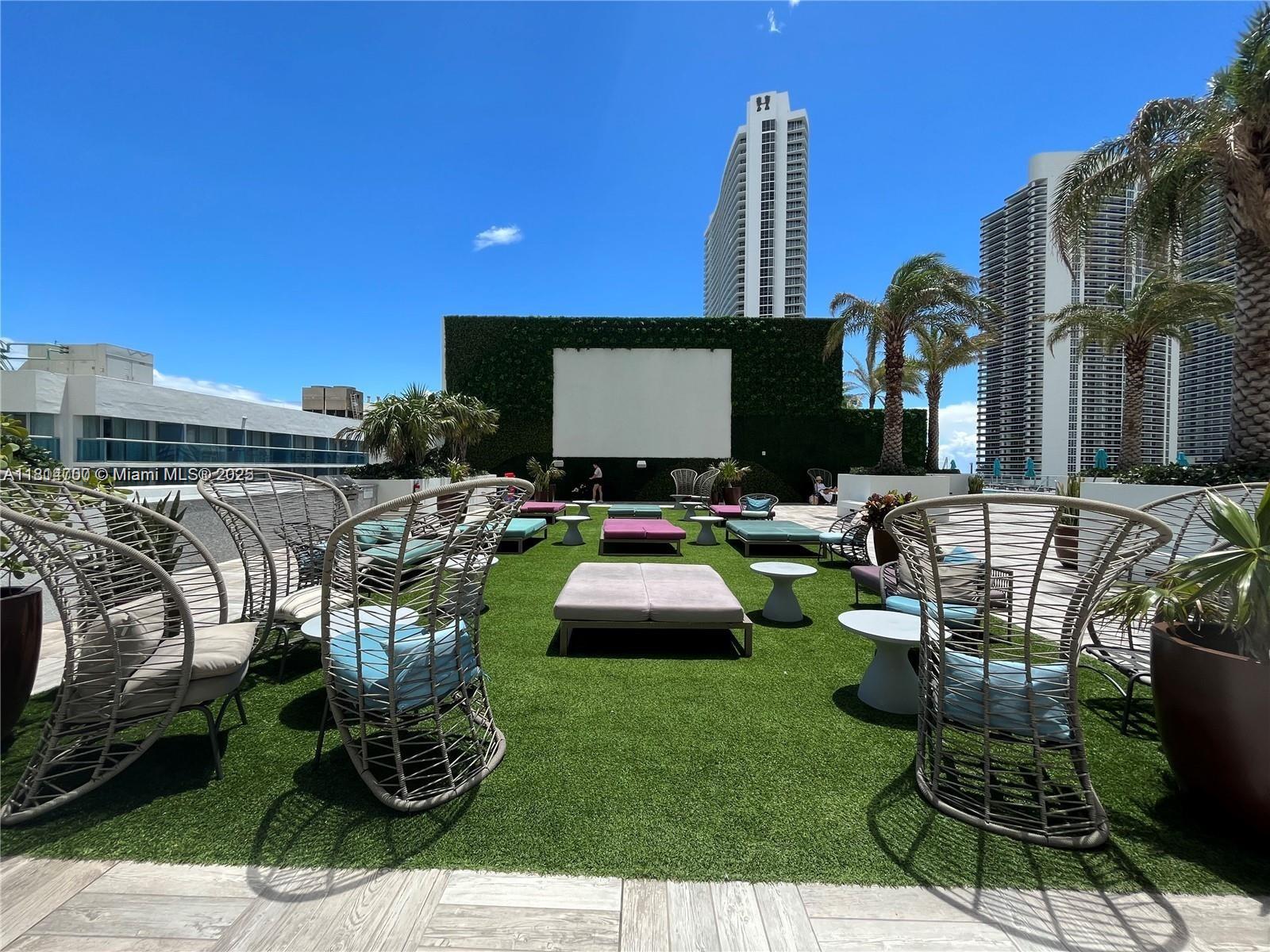 4010 South Ocean Drive, Unit R1905 Hollywood, FL 33019 - Photo 75 of 84 a front view of a house with swimming pool garden and patio