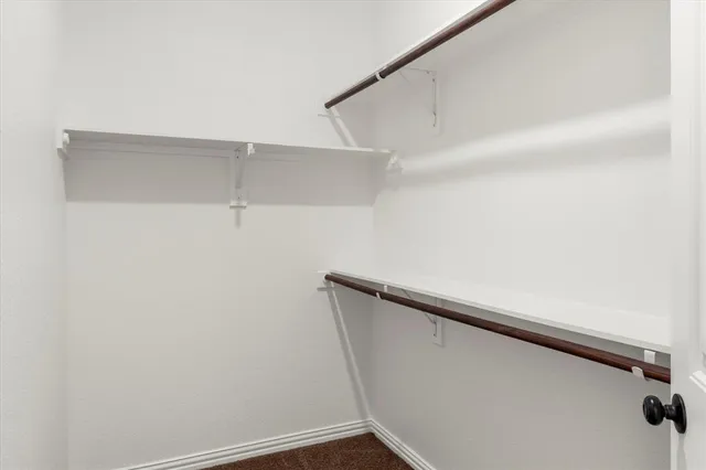 a view of small space with racks on the wall