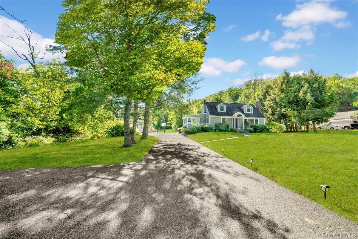610 Farm To Market Road Patterson, NY 10509 - Photo 28 of 32 Cape cod home with a front lawn and driveway