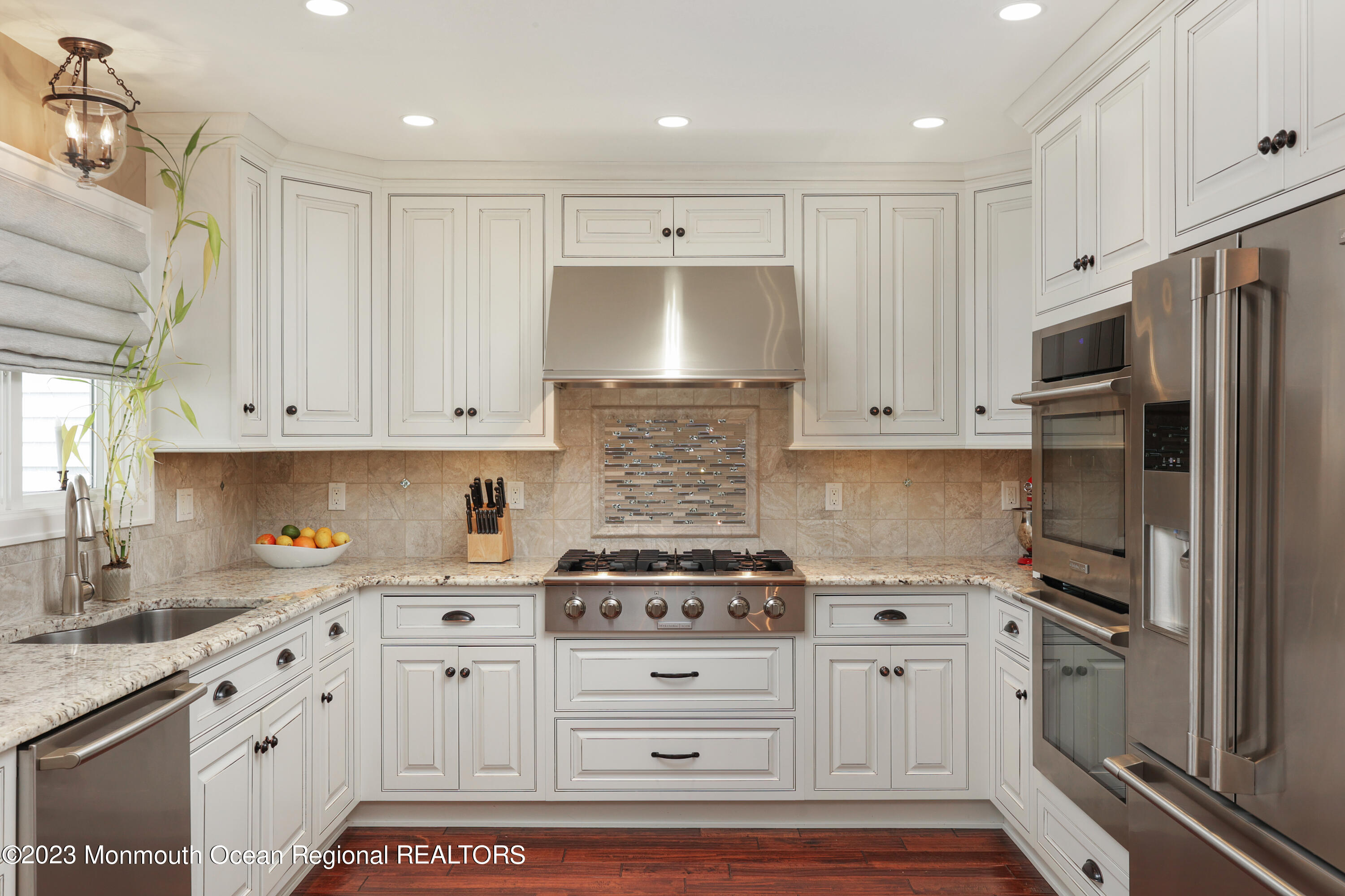 10 Halsey Drive Brick, NJ 08723 - Photo 13 of 46 a kitchen with granite countertop white cabinets white stainless steel appliances and sink