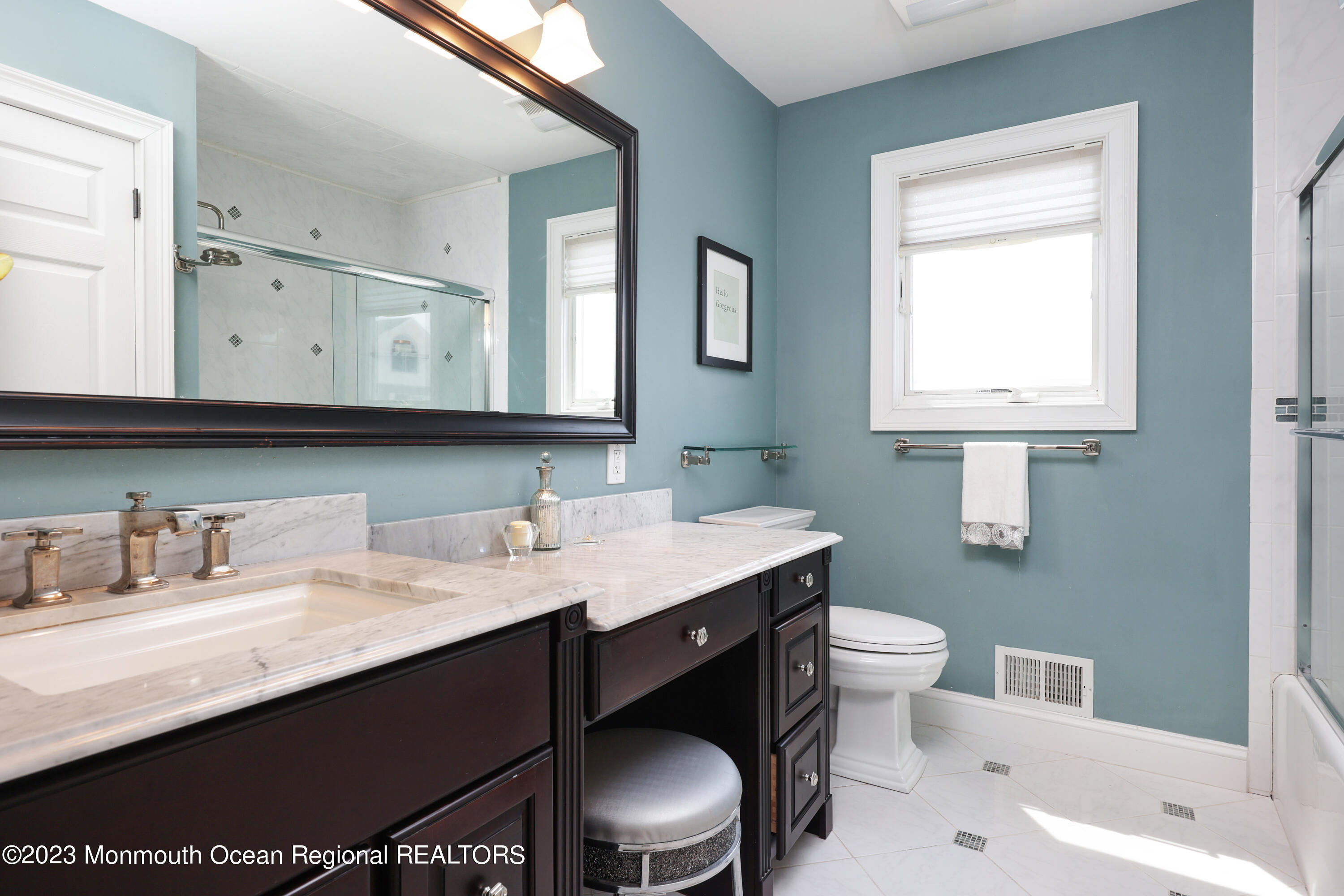 10 Halsey Drive Brick, NJ 08723 - Photo 23 of 46 a bathroom with a sink a toilet and mirror