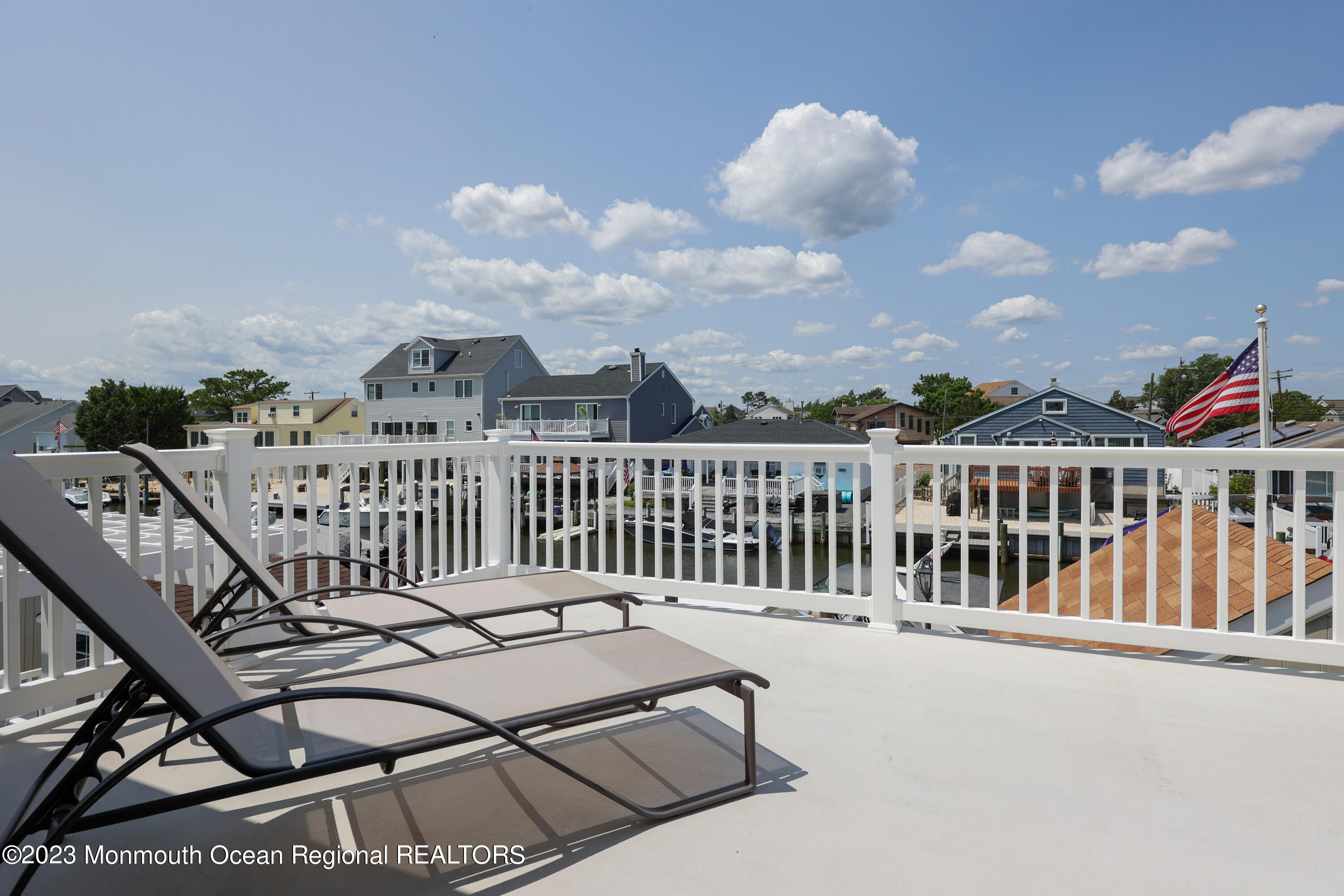 10 Halsey Drive Brick, NJ 08723 - Photo 25 of 46 a view of a balcony with a swing