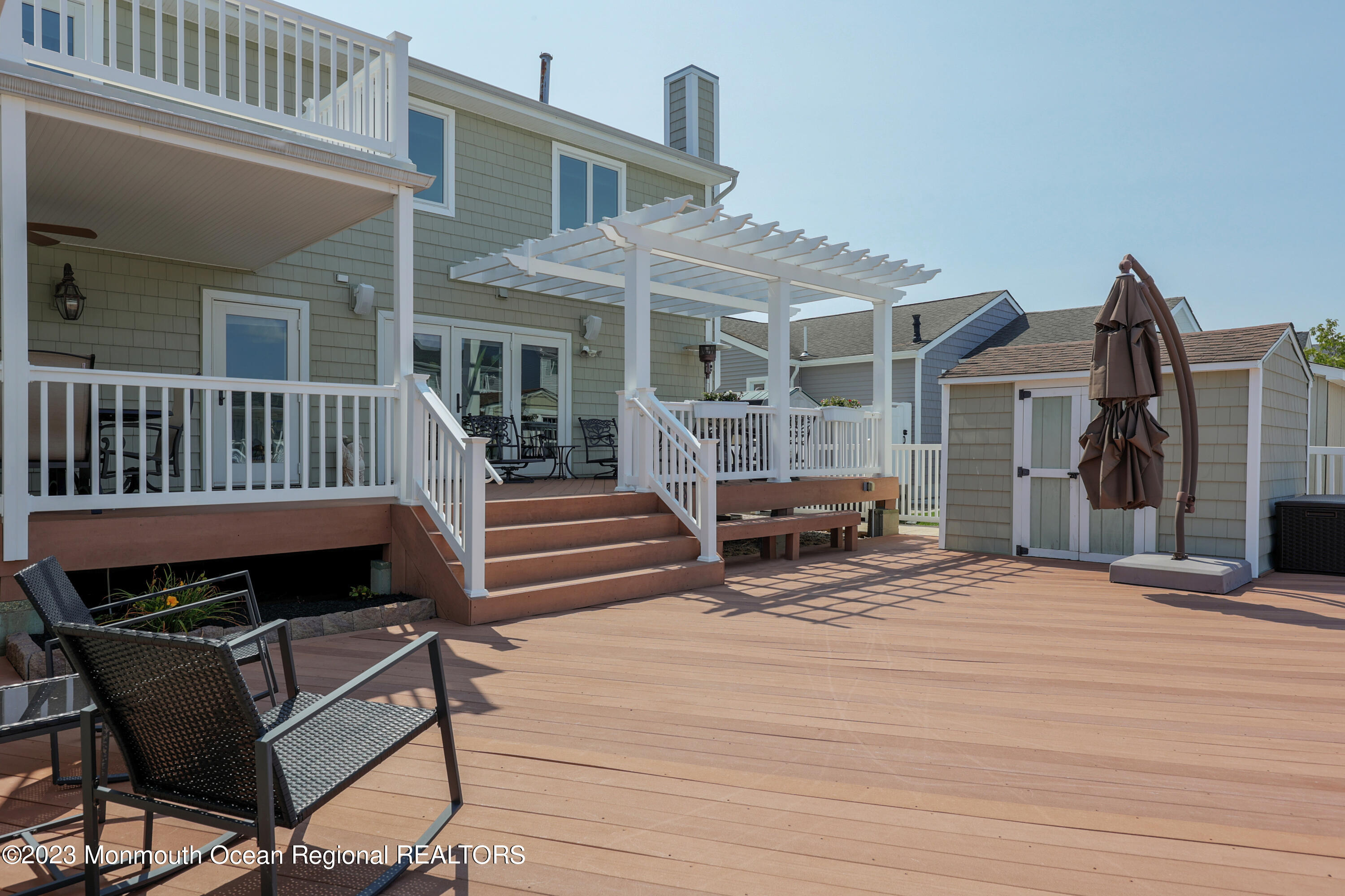 10 Halsey Drive Brick, NJ 08723 - Photo 31 of 46 a view of a patio with a table and chairs