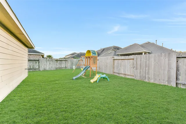 a view of a garden with a slide