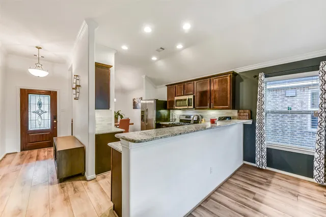 a large kitchen with cabinets