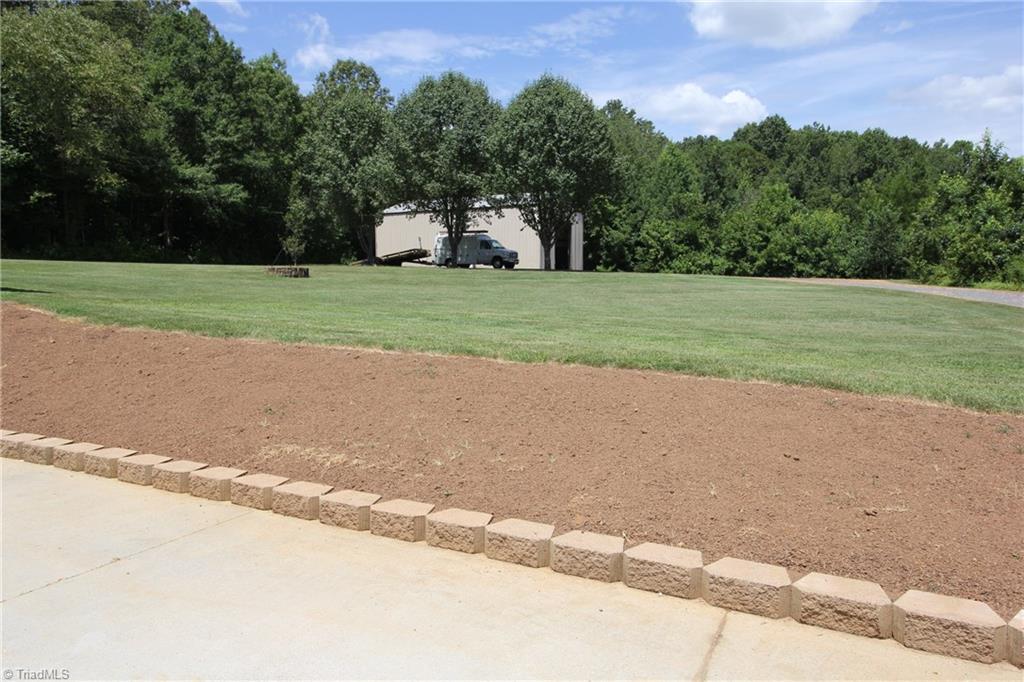 1164 County Home Road Mocksville, NC 27028 - Photo 12 of 18 Fresh dirt, ready for your flowers/bulbs.
