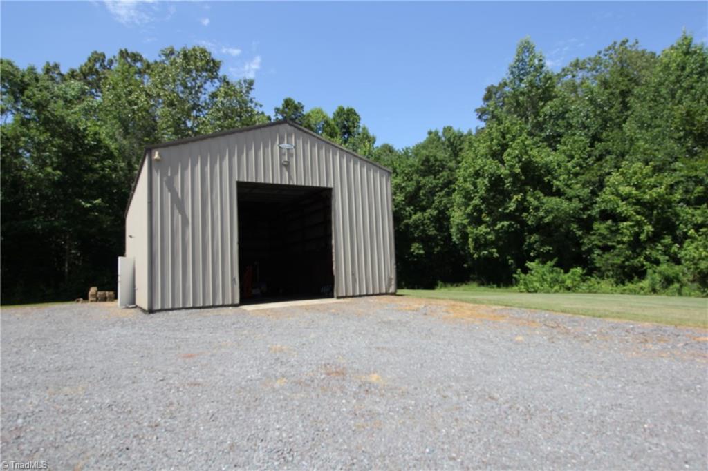 1164 County Home Road Mocksville, NC 27028 - Photo 13 of 18 30x50 shop with 12,000 pound car lift.