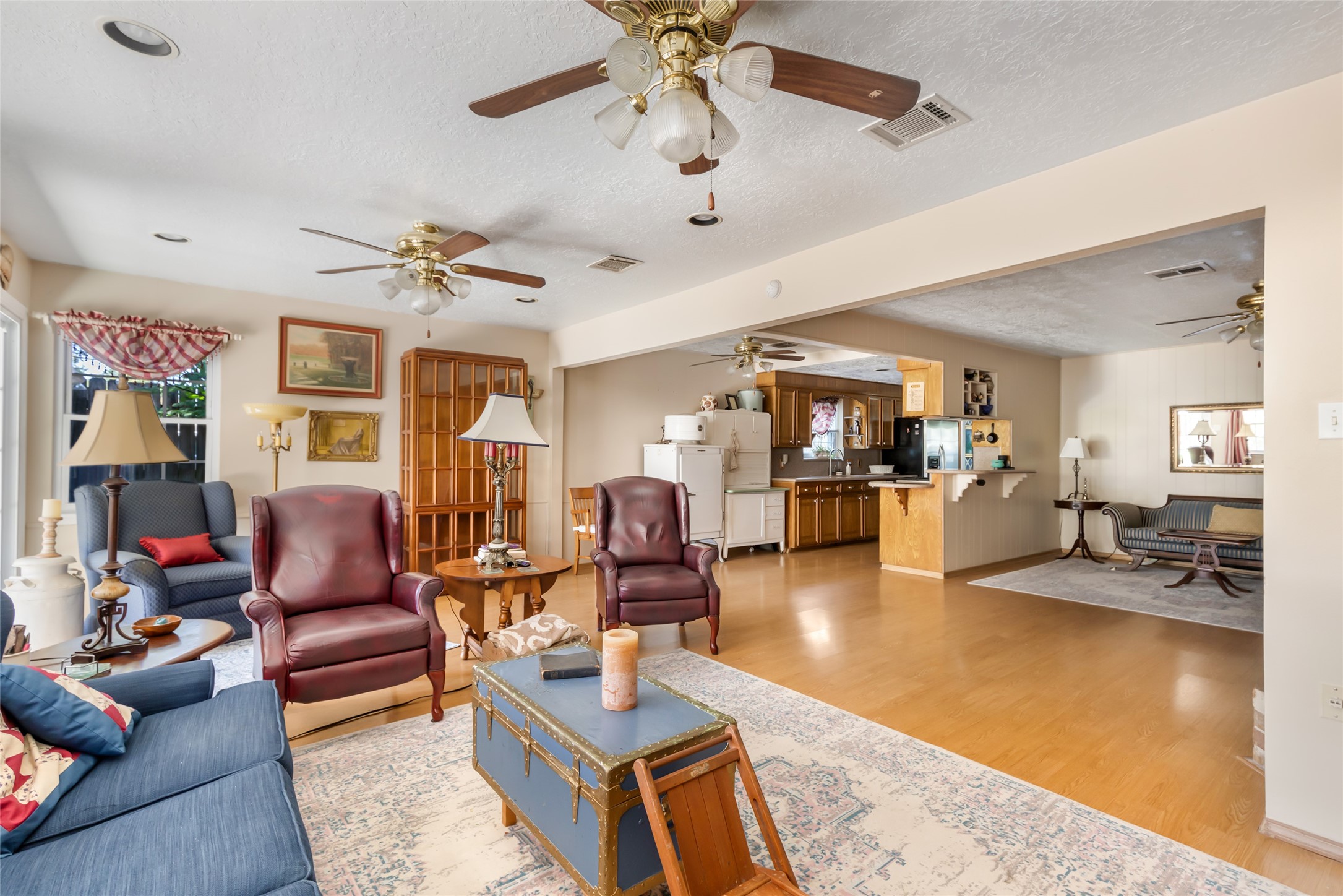 14510 Foxford Way Houston, TX 77015 - Photo 18 of 37 a living room with furniture and wooden floor