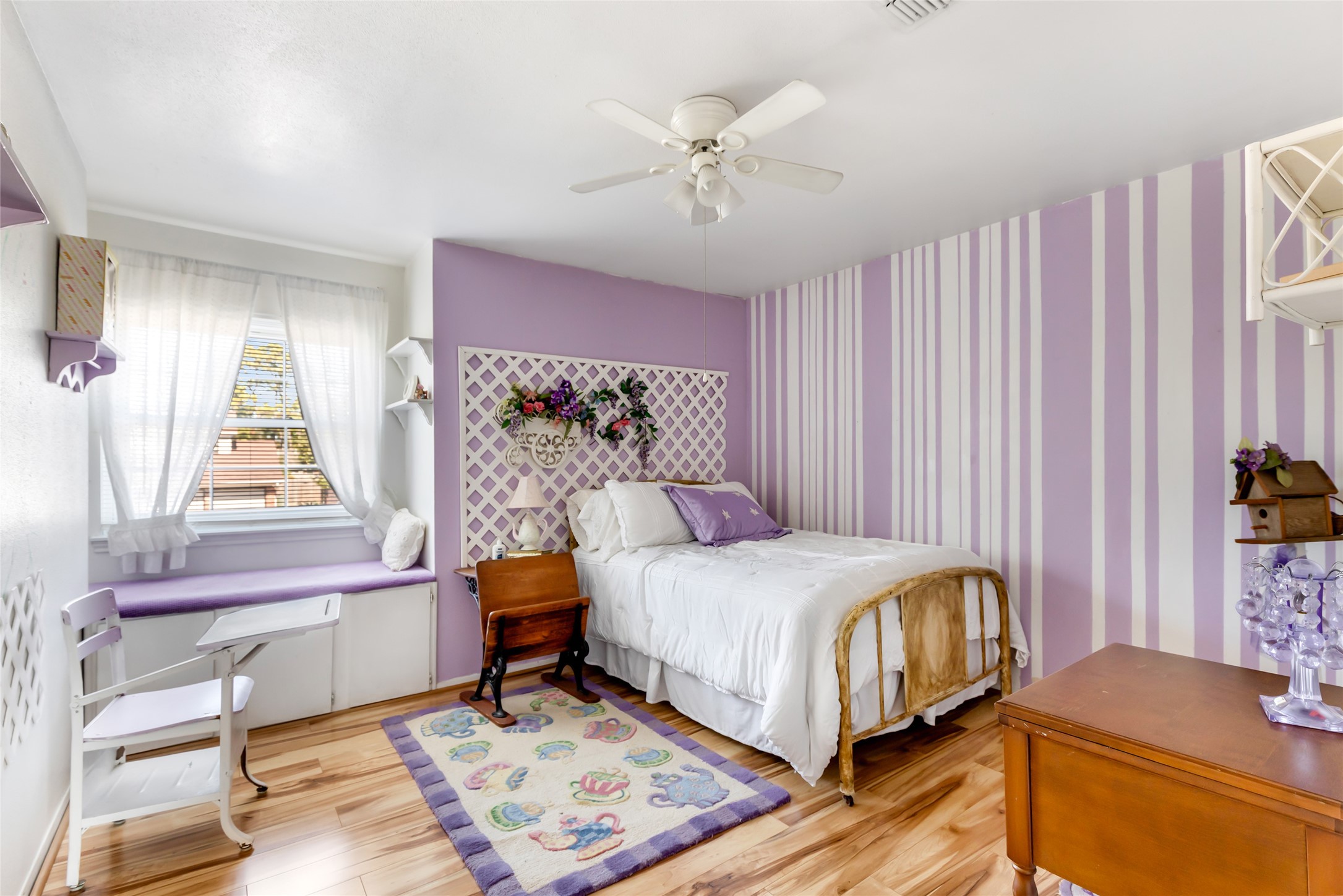 14510 Foxford Way Houston, TX 77015 - Photo 26 of 37 a bedroom with a bed and a chandelier