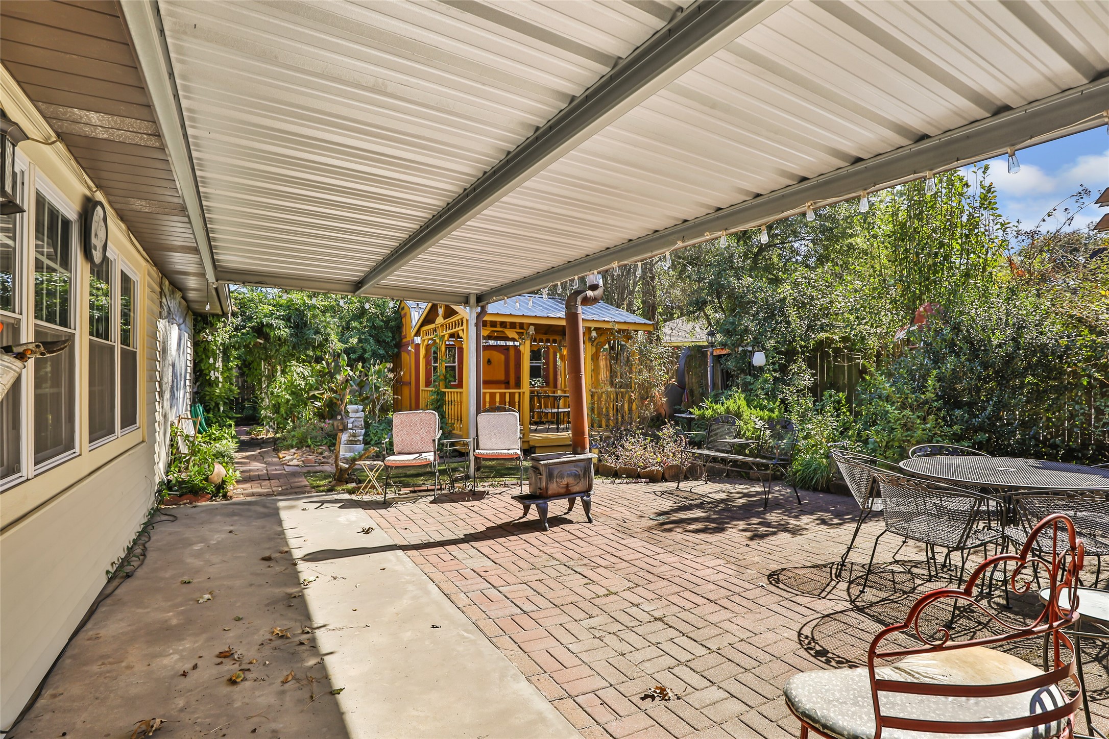14510 Foxford Way Houston, TX 77015 - Photo 32 of 37 a building outdoor space with patio furniture and potted plants