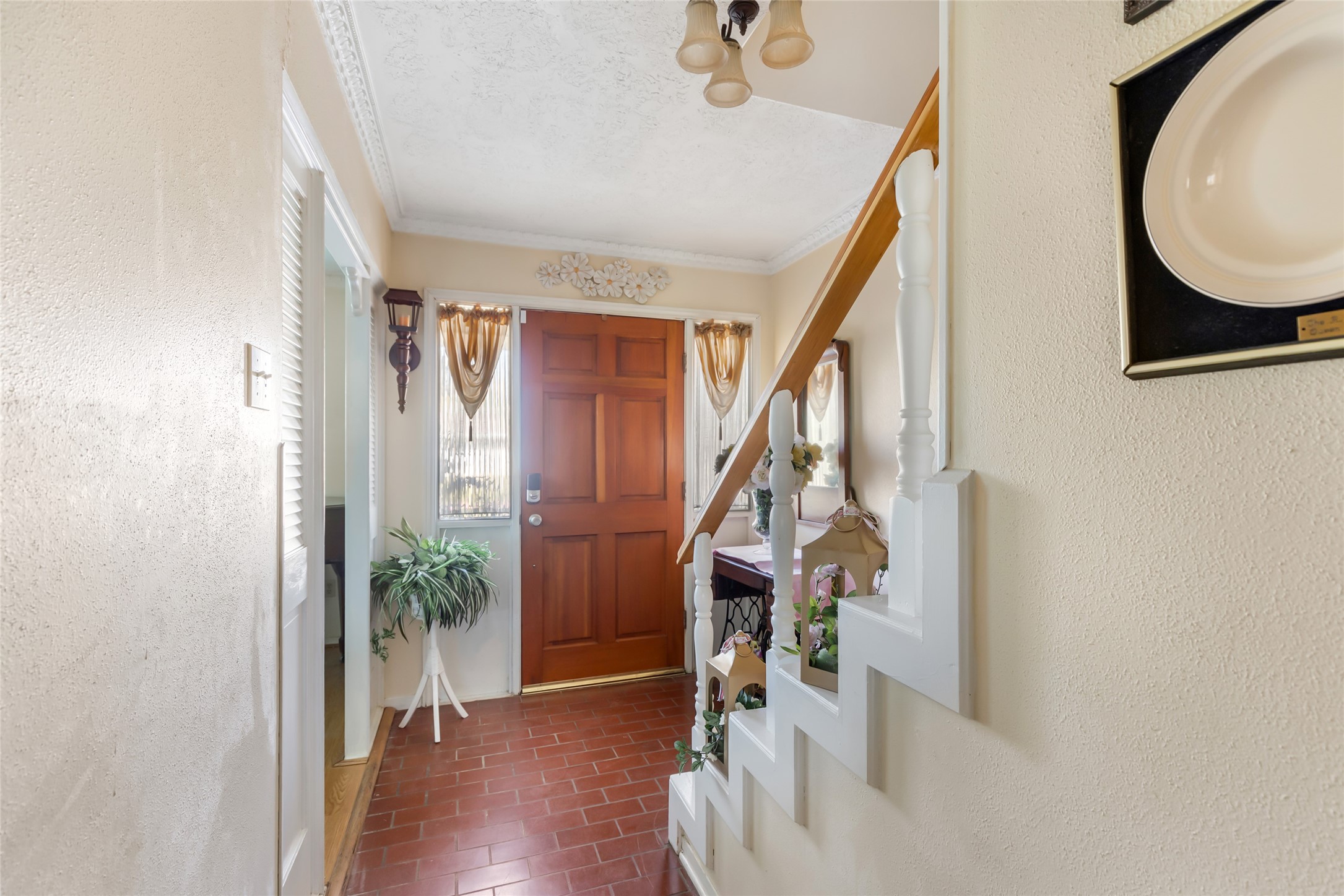 14510 Foxford Way Houston, TX 77015 - Photo 6 of 37 a view of entryway and hall with wooden floor