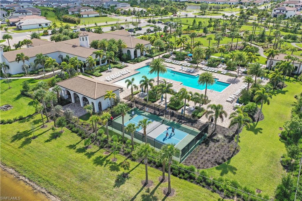 5595 Useppa Drive Ave Maria, FL 34142 - Photo 11 of 13 an aerial view of residential house with outdoor space and swimming pool
