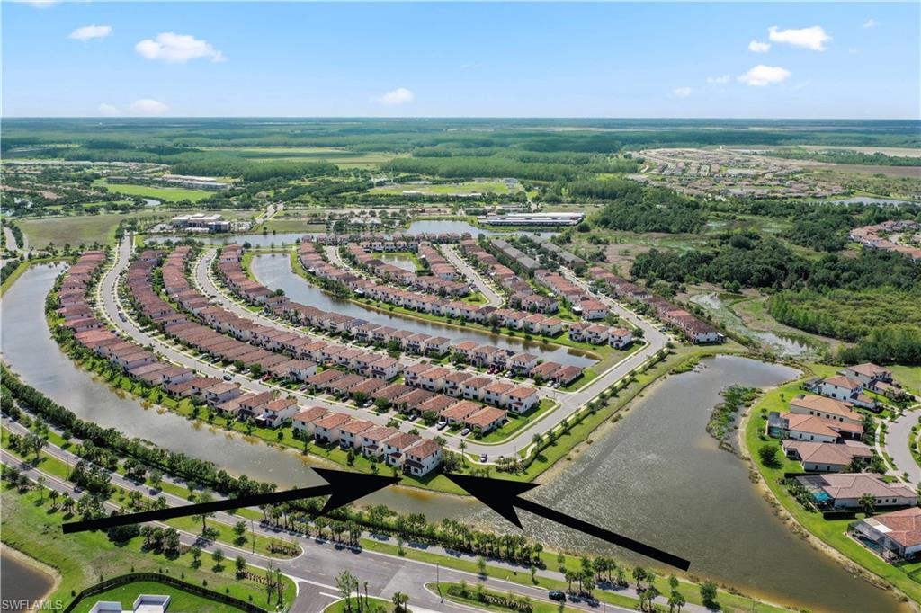 5595 Useppa Drive Ave Maria, FL 34142 - Photo 4 of 13 a view of a city and a mountain view