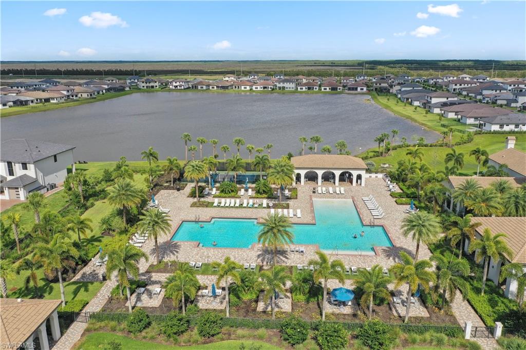 5595 Useppa Drive Ave Maria, FL 34142 - Photo 8 of 13 an aerial view of a house with a lake view