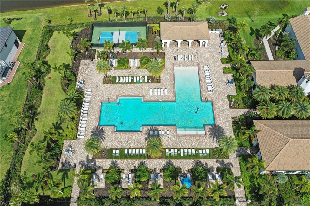 5595 Useppa Drive Ave Maria, FL 34142 - Photo 9 of 13 an outdoor space with swimming pool and outdoor seating