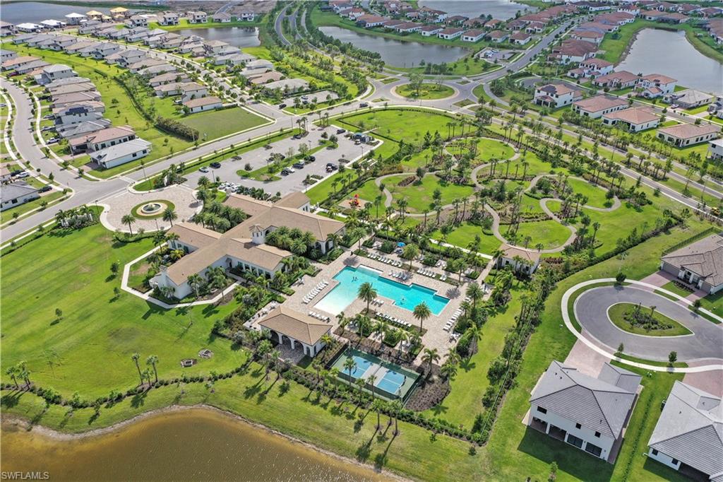 5595 Useppa Drive Ave Maria, FL 34142 - Photo 10 of 13 an aerial view of a house with garden space and street view