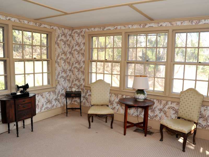 235 North Maple Avenue Greenwich, CT 06830 - Photo 14 of 19 a living room with furniture and a window