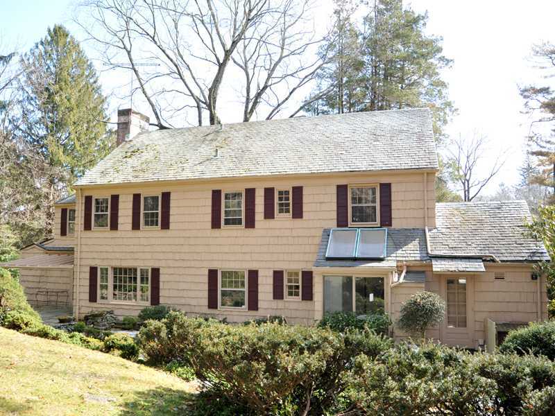 235 North Maple Avenue Greenwich, CT 06830 - Photo 2 of 19 front view of house with a yard