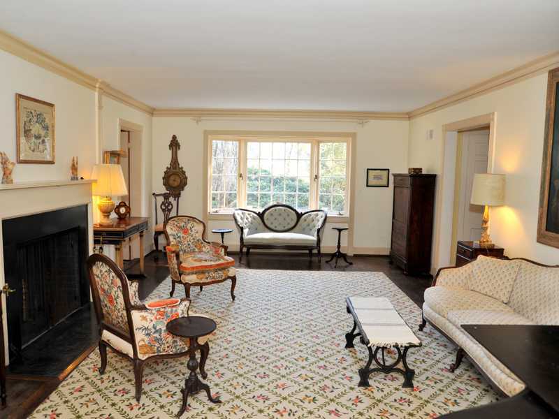 235 North Maple Avenue Greenwich, CT 06830 - Photo 4 of 19 a living room with furniture and a large window