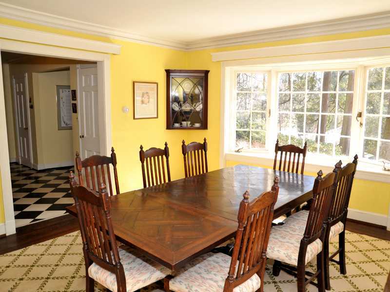 235 North Maple Avenue Greenwich, CT 06830 - Photo 6 of 19 a dining room with furniture a chandelier and wooden floor