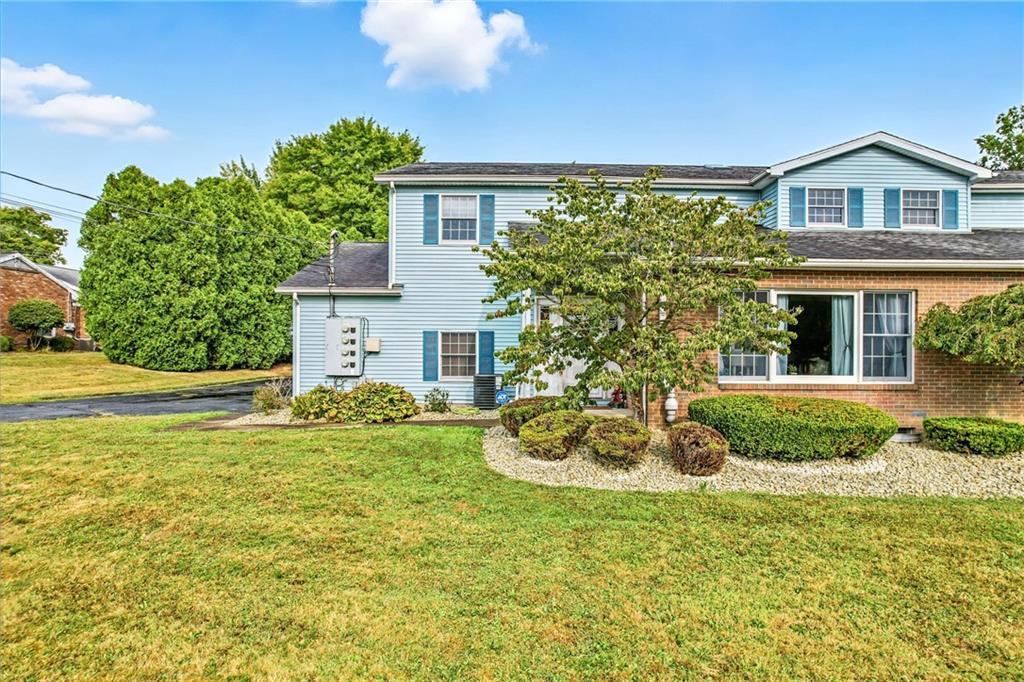 723 Rollinson Road Hermitage, PA 16148 - Photo 1 of 38 a view of a house with backyard and garden