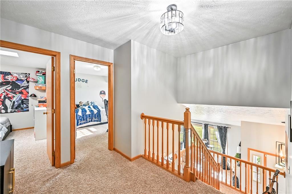 723 Rollinson Road Hermitage, PA 16148 - Photo 18 of 38 a view of a livingroom with furniture and hardwood floor