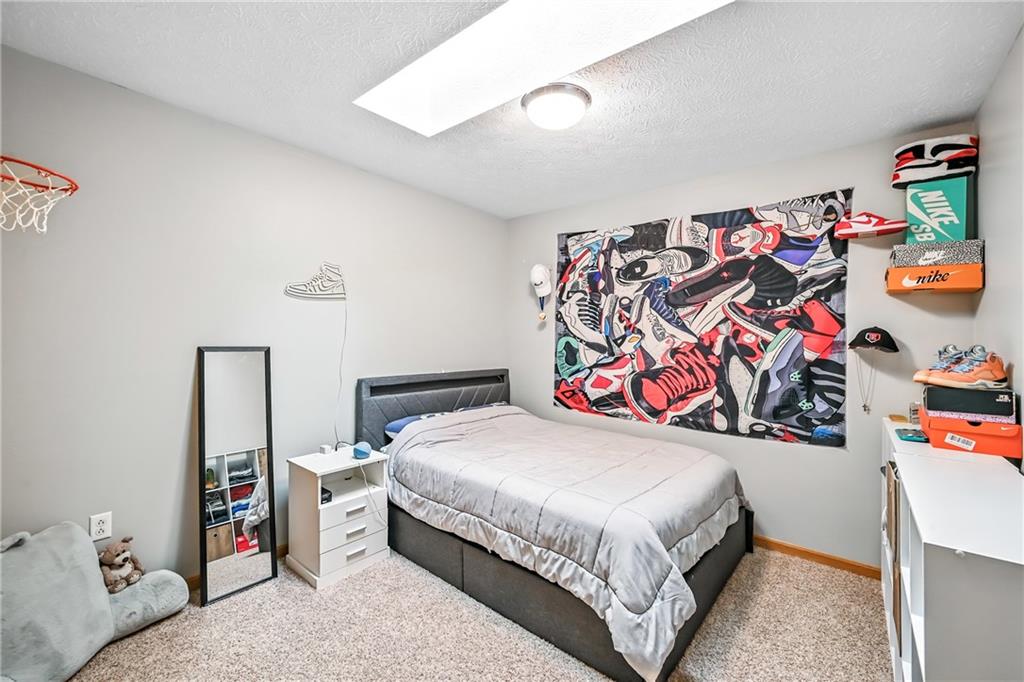 723 Rollinson Road Hermitage, PA 16148 - Photo 20 of 38 a bedroom with a bed and window