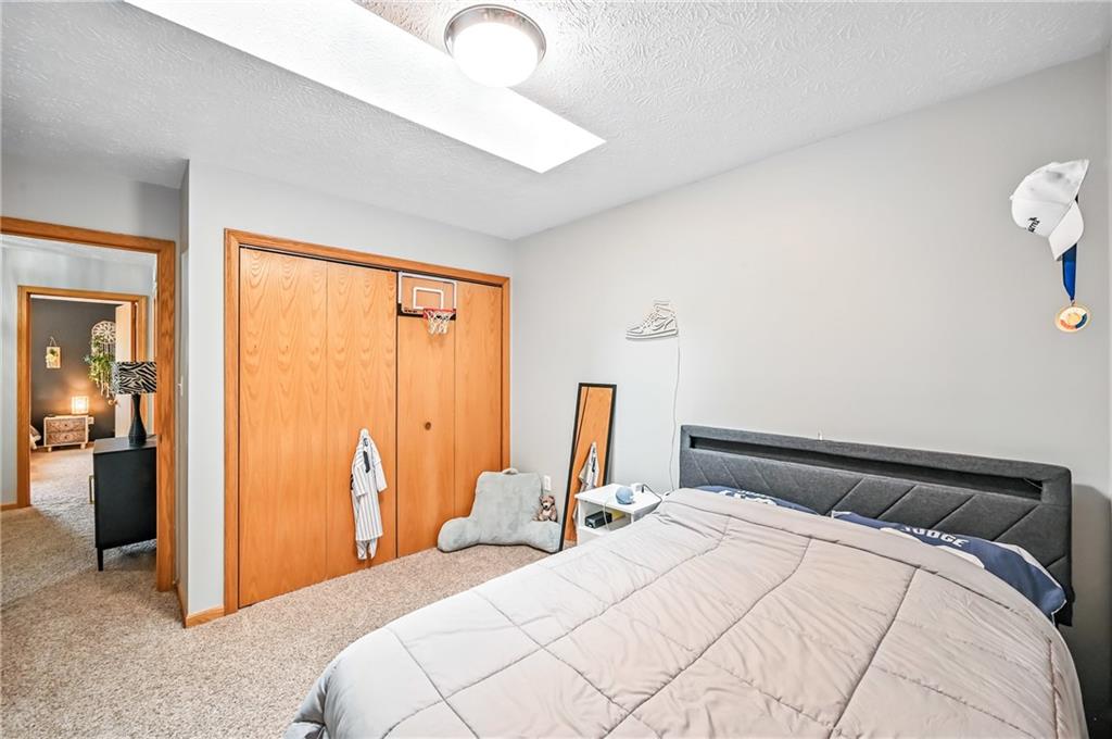 723 Rollinson Road Hermitage, PA 16148 - Photo 21 of 38 a bedroom with bed and wooden floor