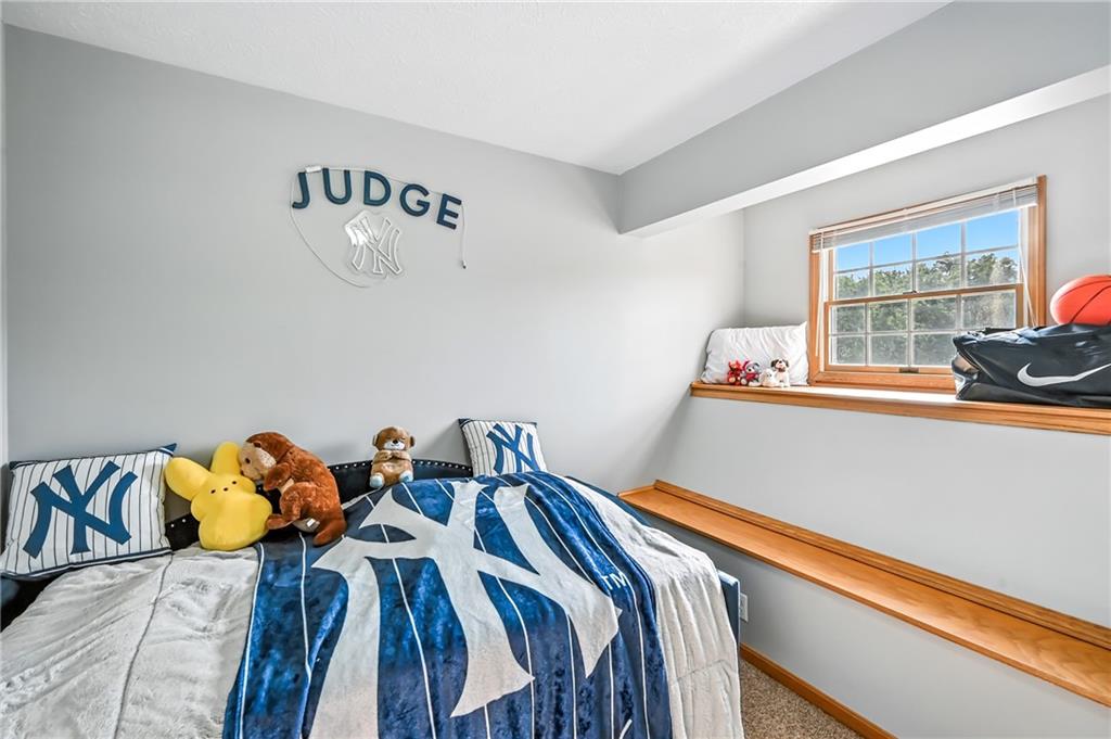 723 Rollinson Road Hermitage, PA 16148 - Photo 23 of 38 a bedroom with a bed and a window