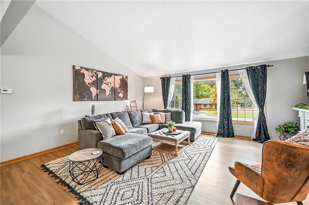 723 Rollinson Road Hermitage, PA 16148 - Photo 10 of 38 a living room with furniture and a large window
