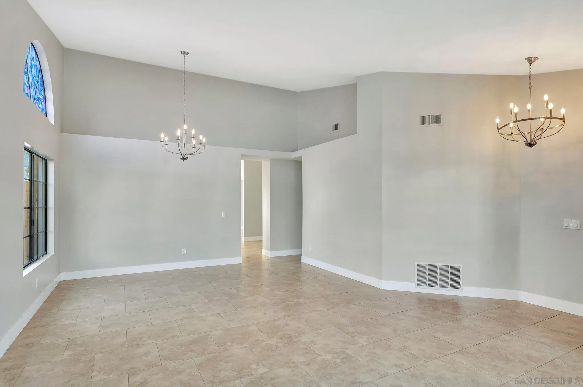 365 Apollo Drive Vista, CA 92084 - Photo 12 of 35 wooden floor in an empty room with a window