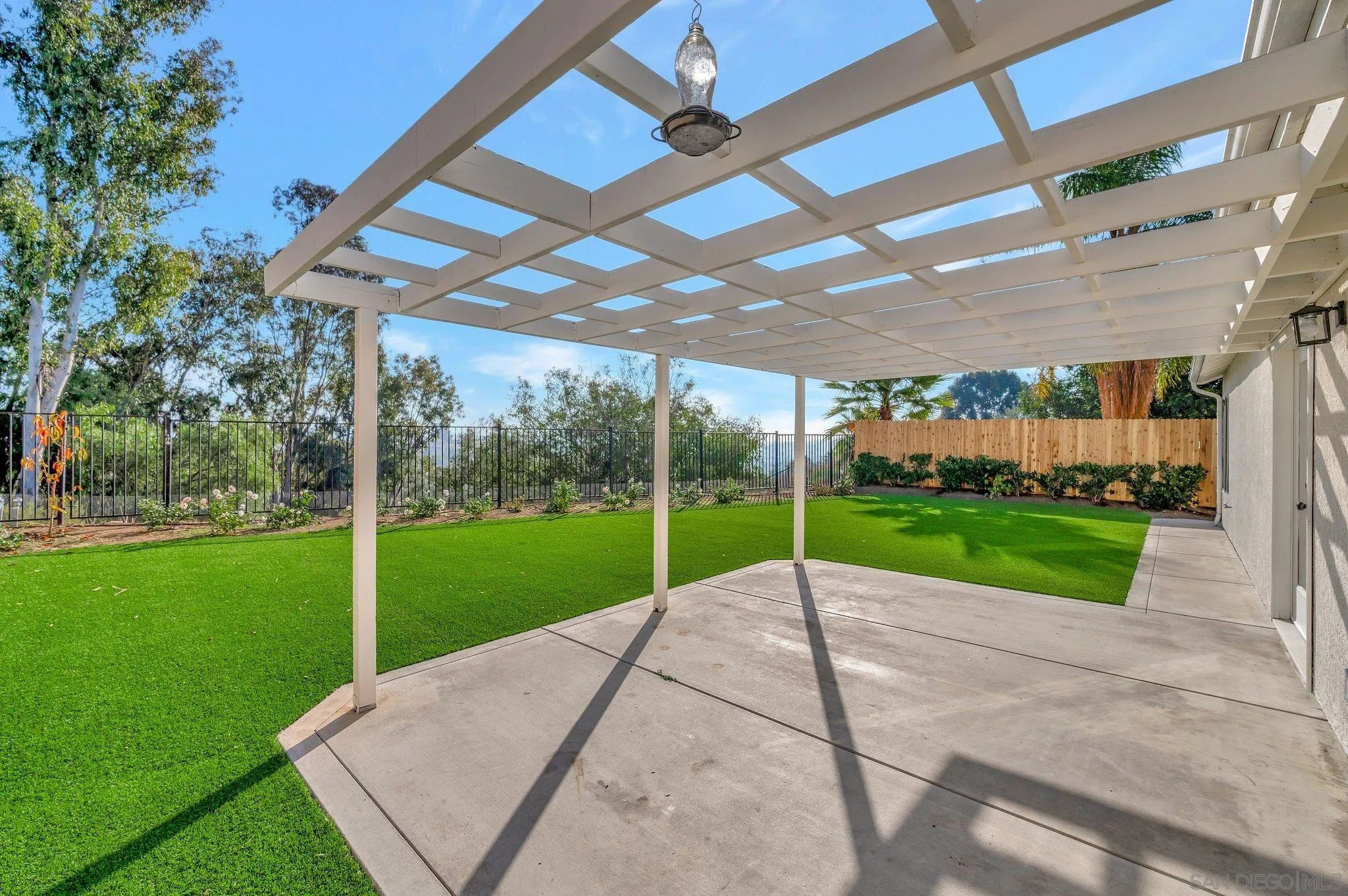 365 Apollo Drive Vista, CA 92084 - Photo 29 of 35 a view of a backyard with a garden and plants