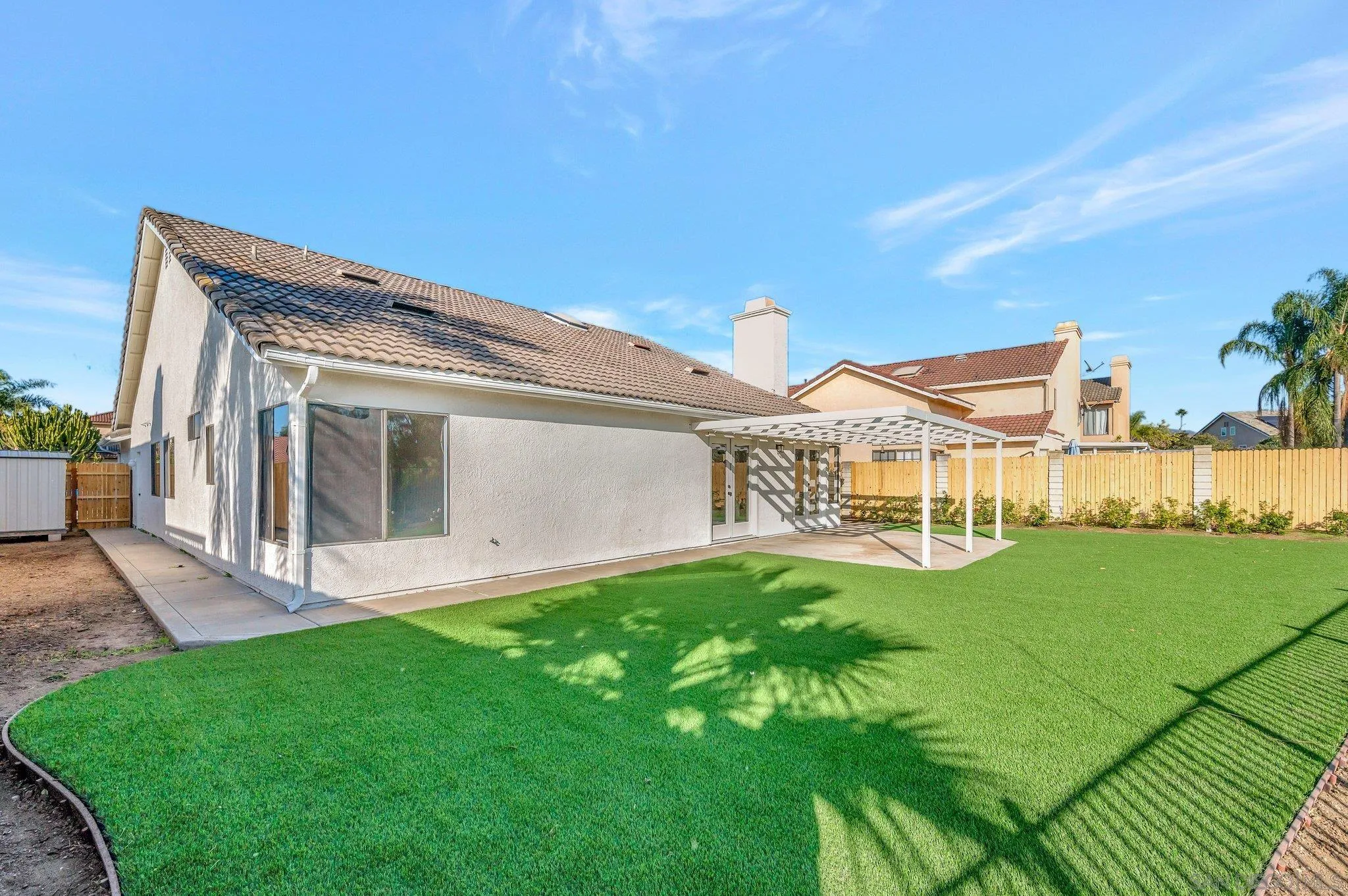 365 Apollo Drive Vista, CA 92084 - Photo 31 of 35 a view of a house with a yard and sitting area